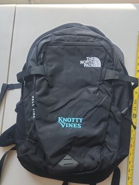 The North Face Black Backpack with Turquoise Knotty Vines Embroidery